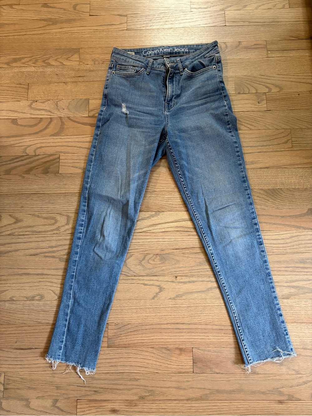 Calvin Klein Jeans Women’s Straight Ripped Hem Jeans